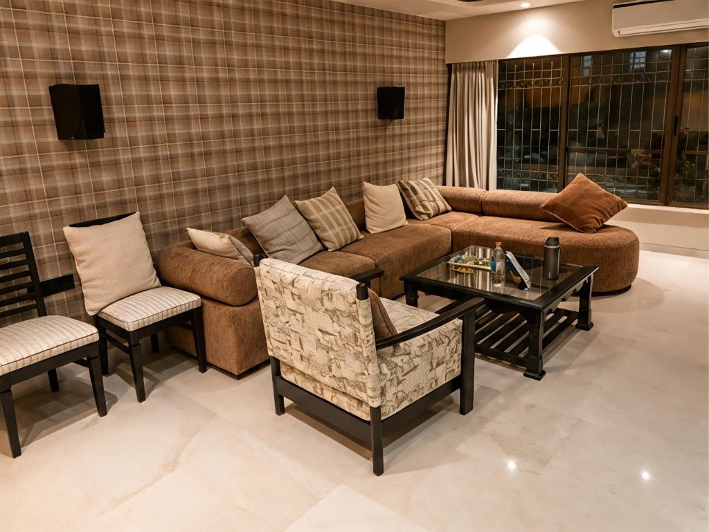 Modern open-concept living room with gold accents in Mulund